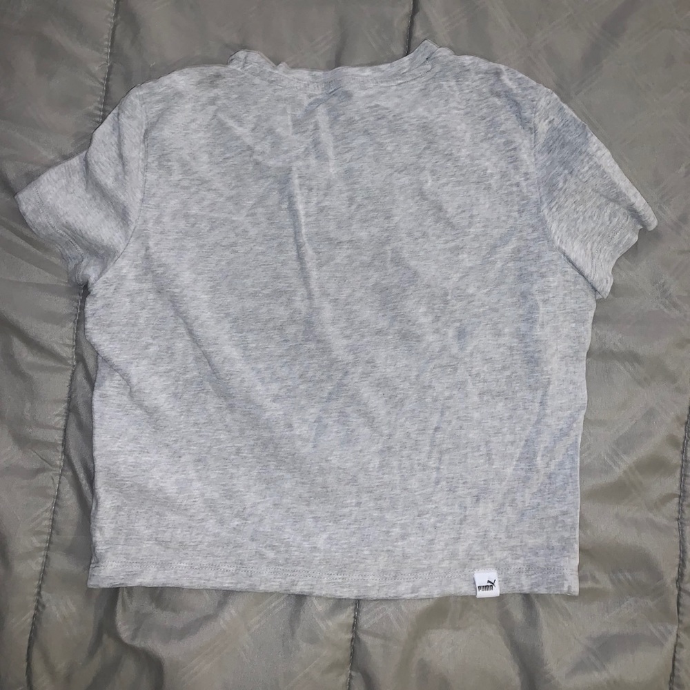 Cropped Puma workout shirt.